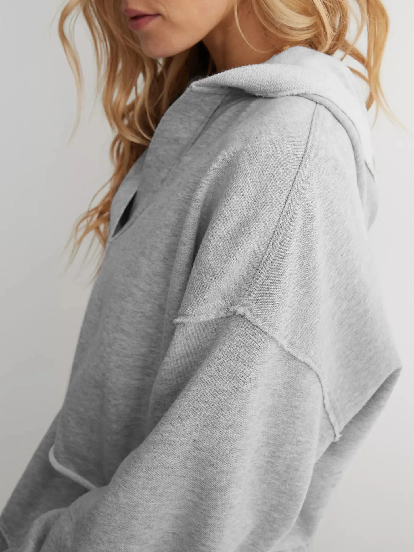 Christine Brewer Eleanor cropped hoodie for women, featuring a stylish, comfortable design in soft fabric, shown in a close-up view.