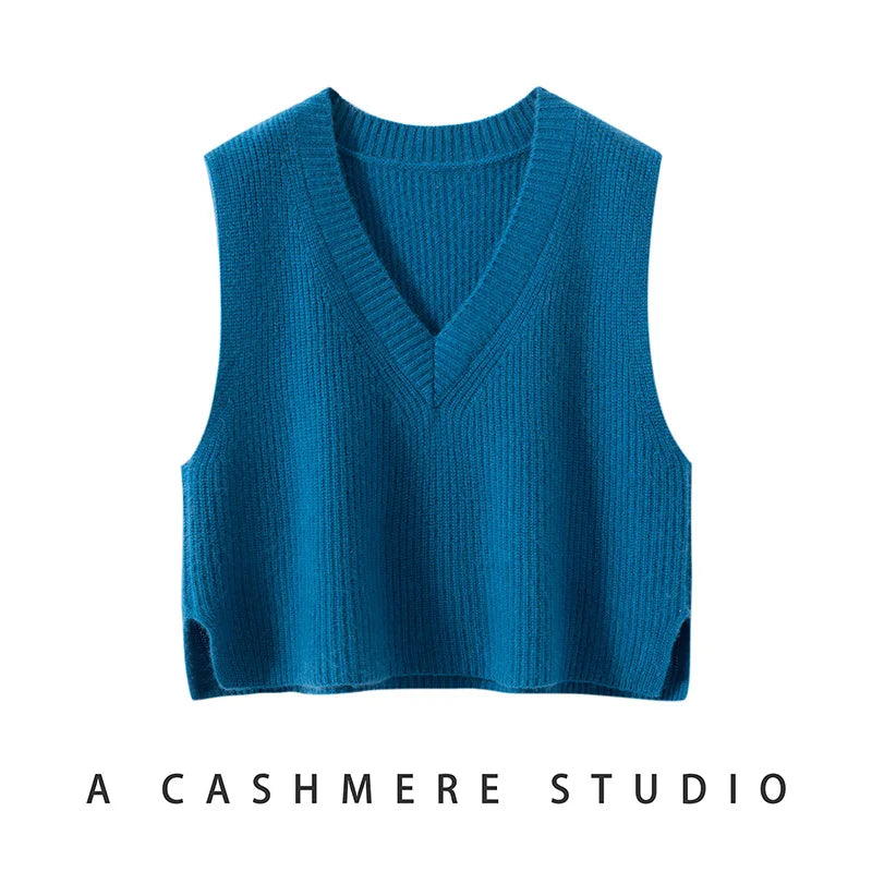 Cream-colored Christine Brewer Etta cashmere ribbed knit sweater vest for women, featuring a cozy, fitted design.