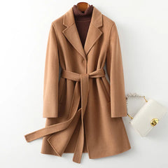 Olivia long belted wool coat for women by Christine Brewer, shown in a stylish, tailored design with a belt and classic wool fabric.