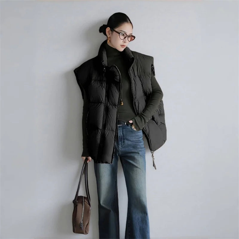 Christine Brewer Layla cropped puffer vest for women, featuring quilted design and stand collar, ideal for cold weather.