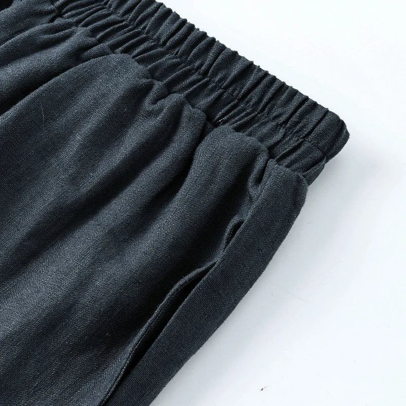Linen cropped wide-leg drawstring trousers for women by Christine Brewer, loose pull-on pants with a relaxed fit.