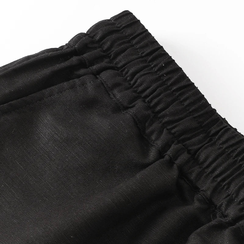 Women’s cotton linen wide leg drawstring trousers by Christine Brewer, loose pull-on pants with relaxed fit and comfortable style.