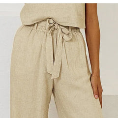 Women’s linen wide-leg trousers by Christine Brewer featuring loose, pull-on style and relaxed fit, perfect for casual wear.
