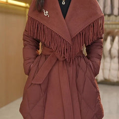 Christine Brewer Stella belted quilted puffer jacket for women, shown in a close-up of the stylish, insulated winter coat.