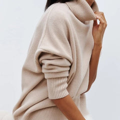 Christine Brewer Erica women's oversized turtleneck sweater in soft knit, showcasing a cozy, relaxed fit in a neutral color.