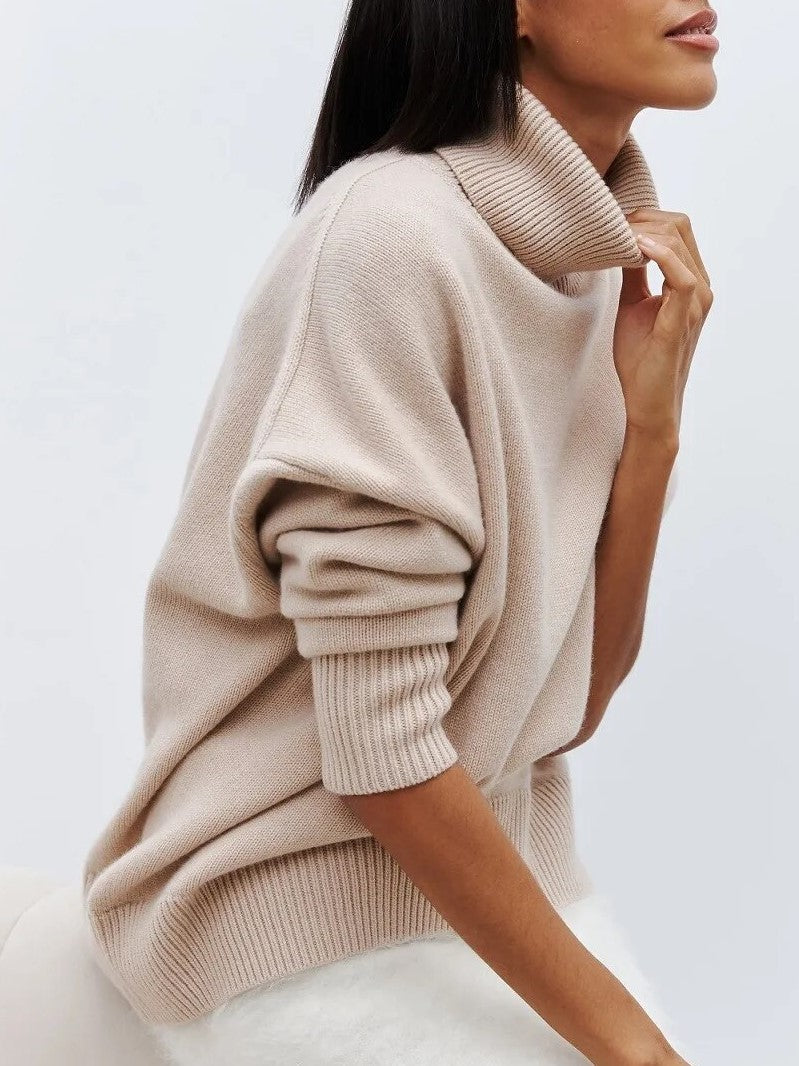 Christine Brewer Erica women's oversized turtleneck sweater in soft knit, showcasing a cozy, relaxed fit in a neutral color.