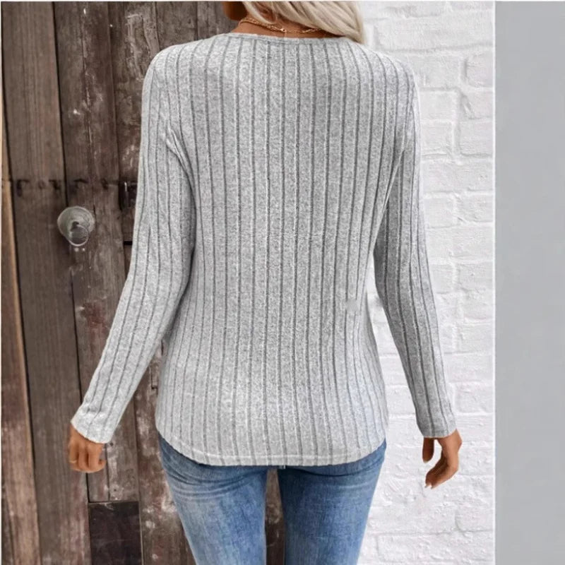Kaitlyn striped women's sweater by Christine Brewer featuring a cozy, stylish knit with bold horizontal stripes in various colors.