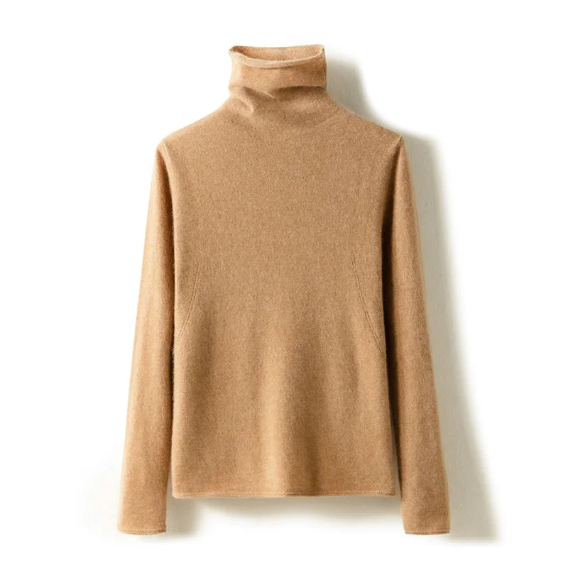 Cream-colored Gabrielle cashmere turtleneck sweater for women, featuring a cozy fit and ribbed collar, by Christine Brewer.