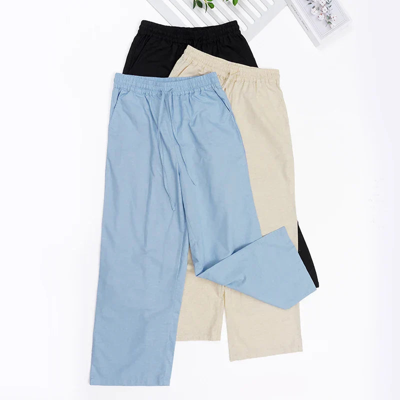 Women’s cotton linen wide-leg drawstring trousers by Christine Brewer, loose pull-on pants with relaxed fit and comfortable design.