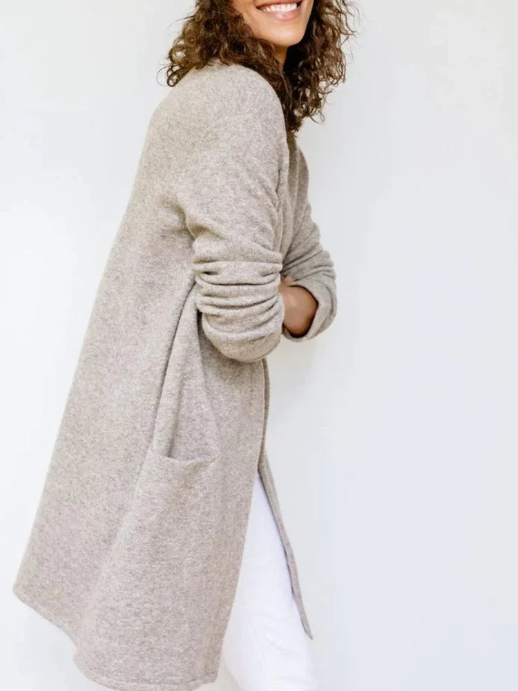 Jacqueline Merino Wool Cardigan for Women by Christine Brewer, showcasing a cozy, fitted knit sweater in a neutral color.