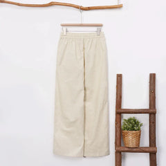 Women’s cotton linen wide-leg drawstring trousers by Christine Brewer, loose pull-on pants in a relaxed fit.
