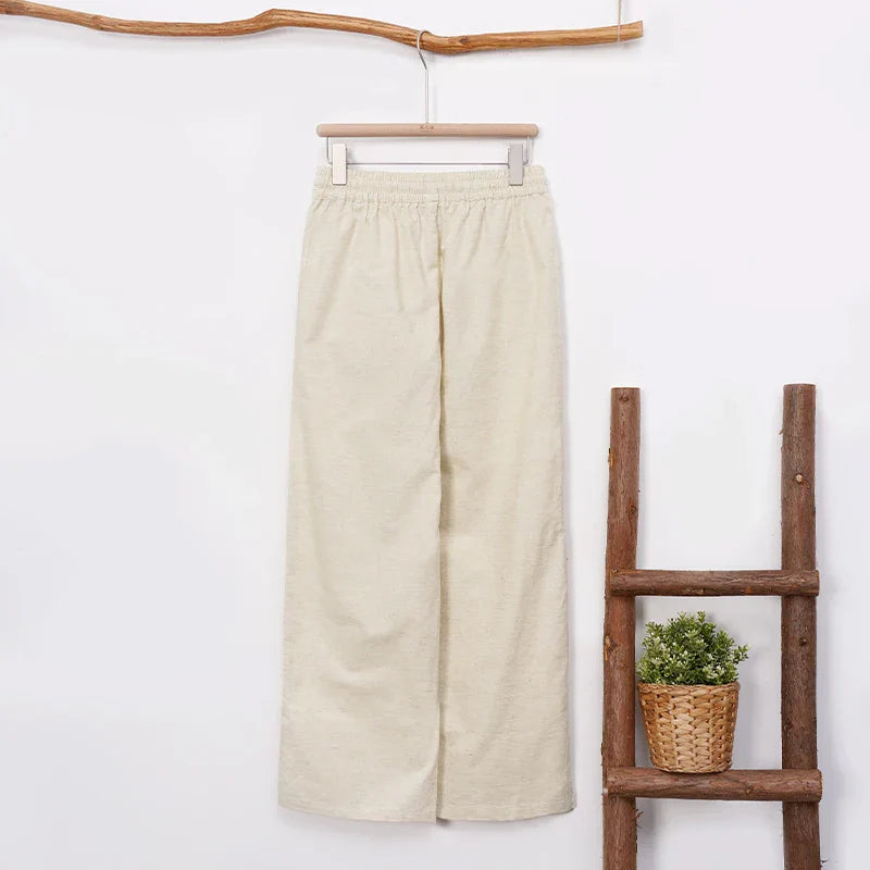 Women’s cotton linen wide-leg drawstring trousers by Christine Brewer, loose pull-on pants in a relaxed fit.