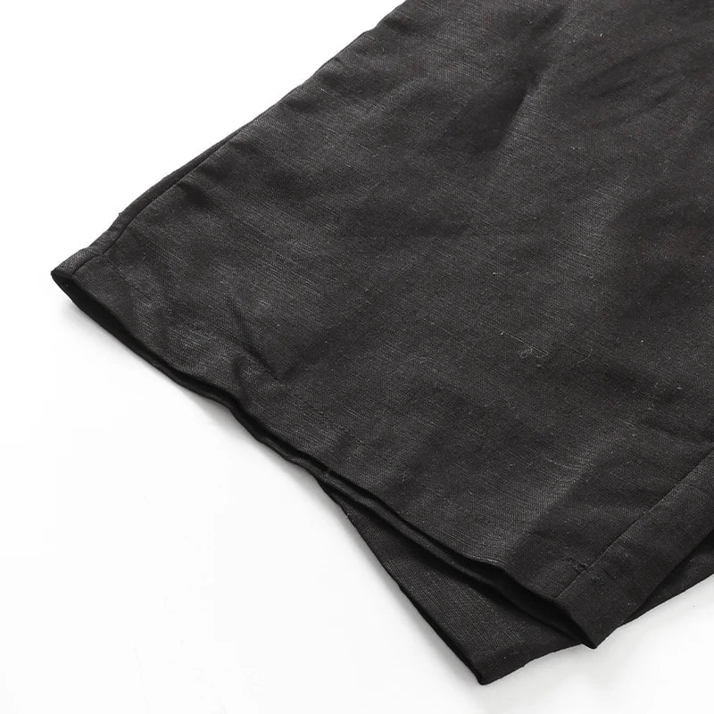 Women’s cotton linen wide-leg drawstring trousers by Christine Brewer, loose pull-on pants with relaxed fit and comfortable style.