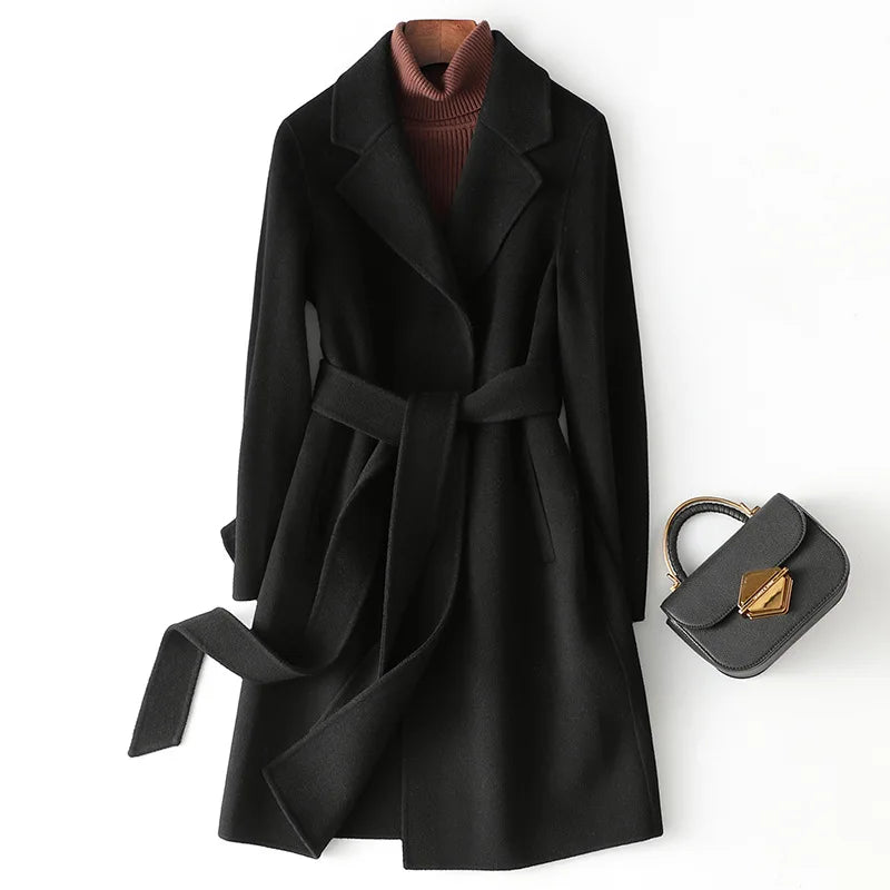Olivia long belted wool coat for women by Christine Brewer, shown in a stylish, tailored design with a belt and classic silhouette.