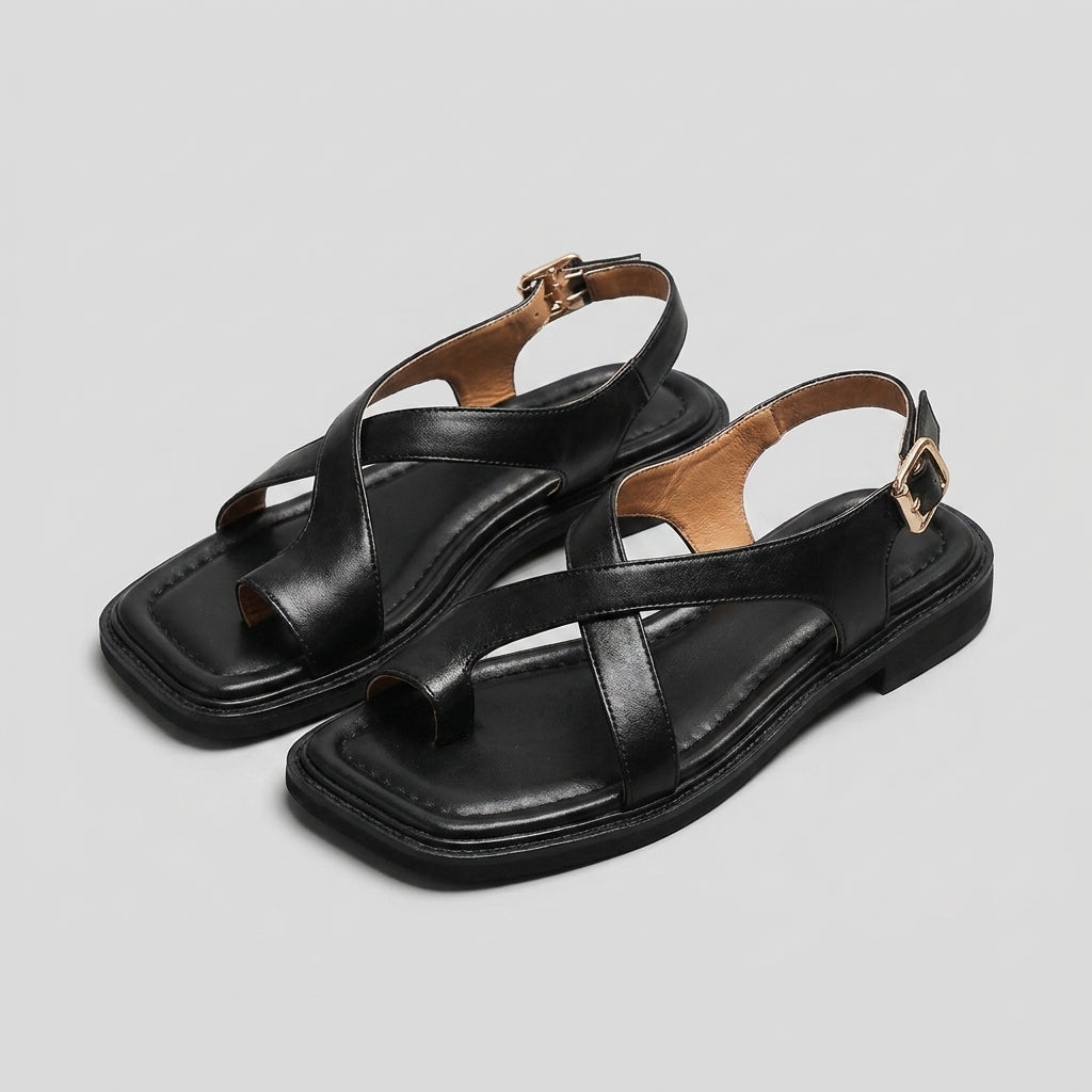 Square-toe block-heel criss-cross sandals for women by Christine Brewer, featuring stylish design and comfortable fit.