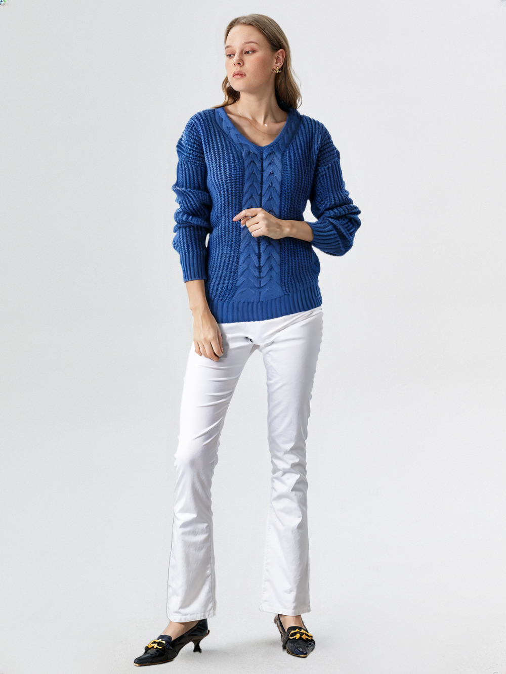 Women’s Morgan V-Neck Sweater by Christine Brewer, soft knit fabric, fitted style, in a neutral color, shown on a model.