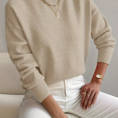 Women’s high neck sweater by Christine Brewer, Samantha style, featuring a cozy knit design and a classic fit in neutral color.