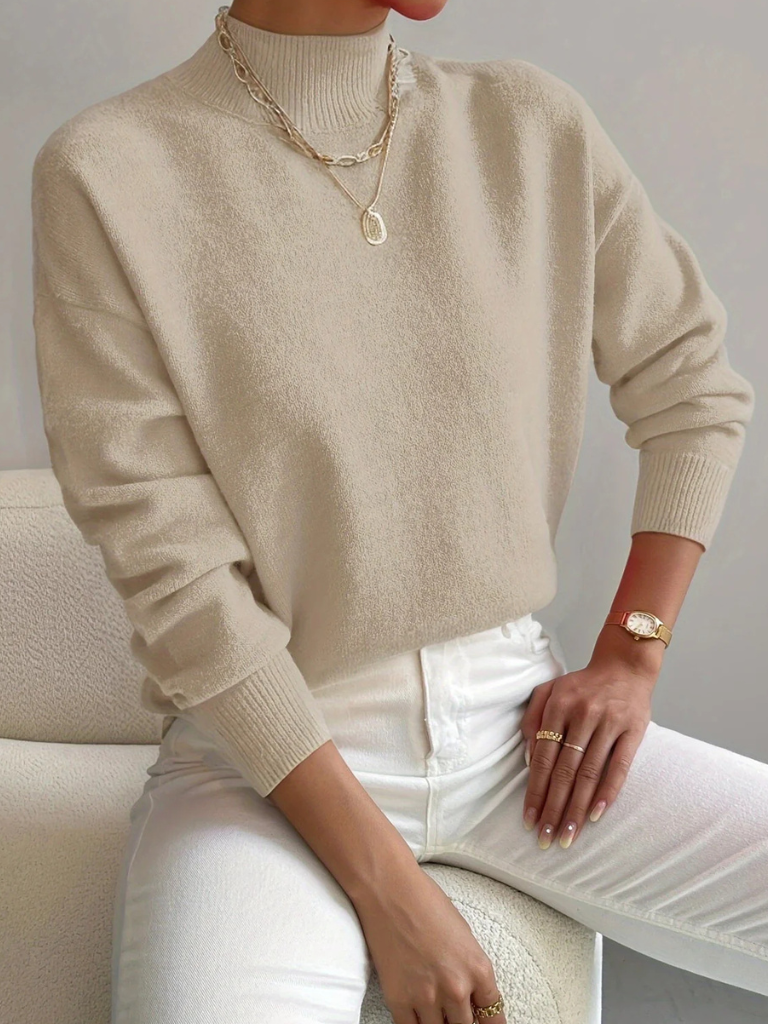 Women’s high neck sweater by Christine Brewer, Samantha style, featuring a cozy knit design and a classic fit in neutral color.