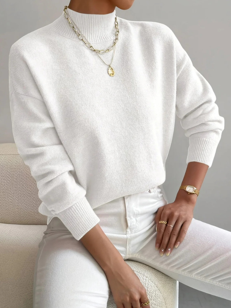Christine Brewer Samantha high neck sweater for women, showcasing a cozy knit sweater with a high neckline and long sleeves.