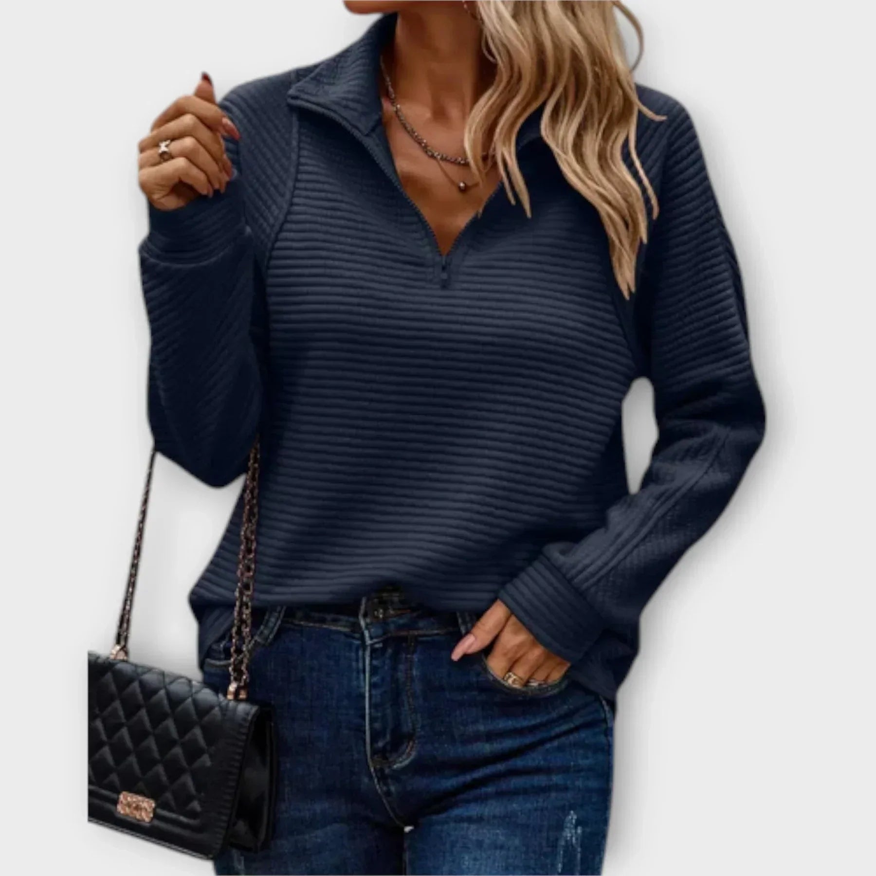 Katherine women's V-neck half-zip sweater by Christine Brewer, shown in a stylish, close-up image highlighting the neckline and fabric texture.