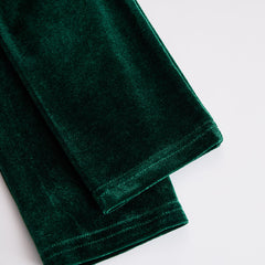 Velvet midi dress by Christine Brewer featuring a fitted silhouette and elegant design, suitable for evening wear.