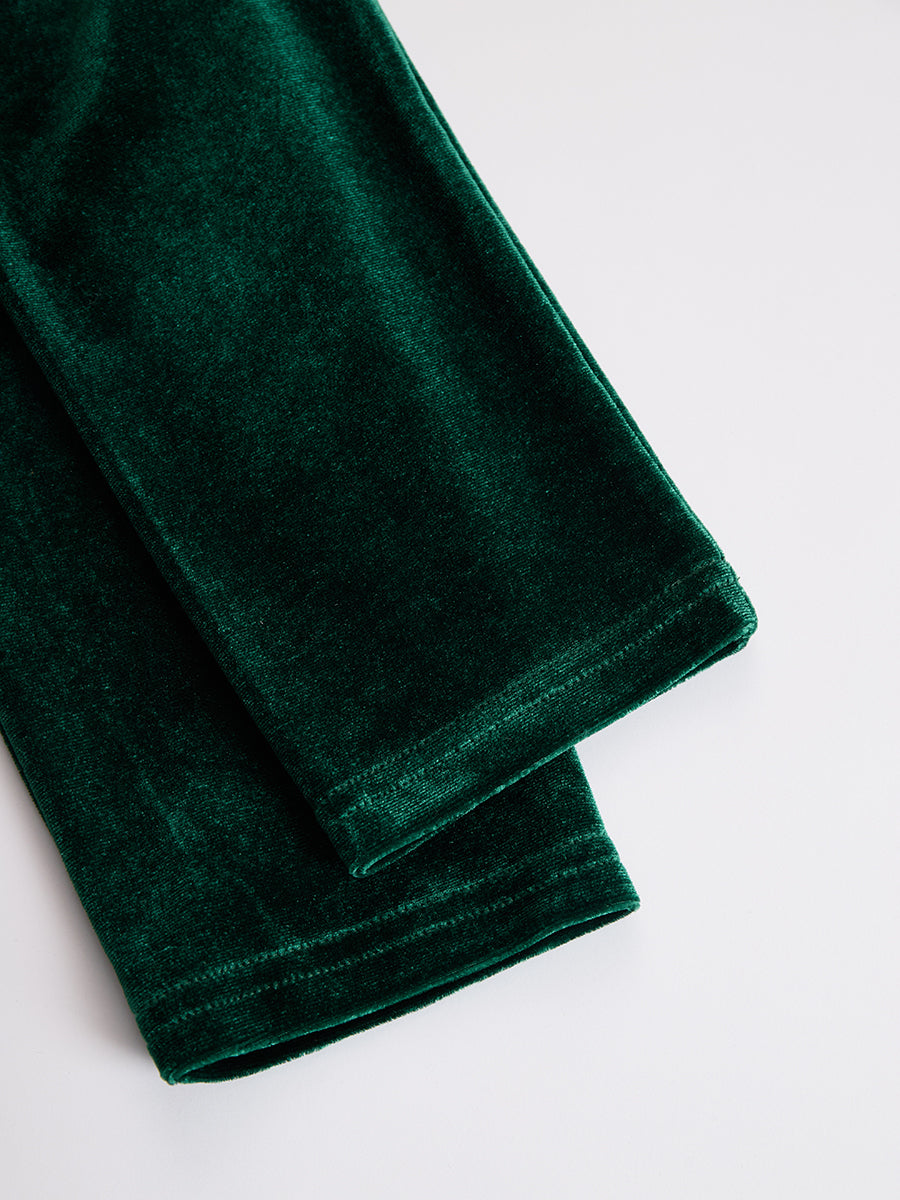 Velvet midi dress by Christine Brewer featuring a fitted silhouette and elegant design, suitable for evening wear.
