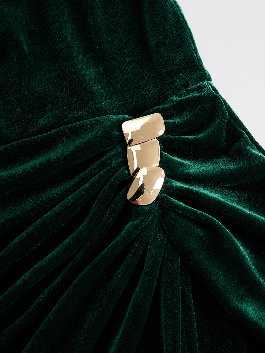 Velvet midi evening dress by Christine Brewer, showcasing a fitted silhouette with elegant long sleeves and a knee-length hem.