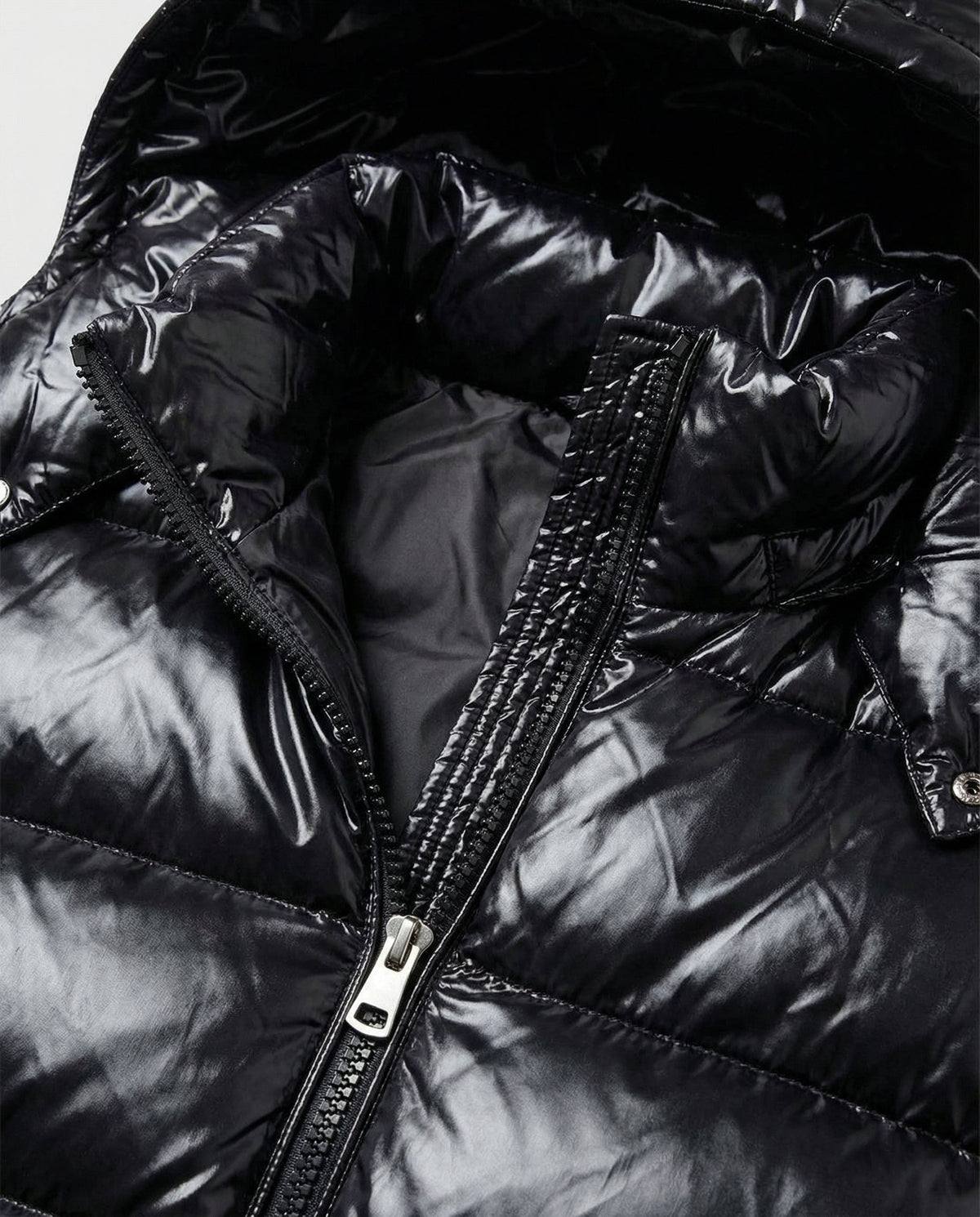 Close-up of the Christine Brewer Naomi Cosy Puffer Jacket for Women showing quilted fabric and detailed stitching.