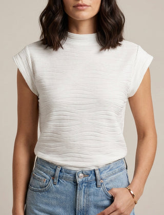 White high neck cap sleeve summer top for women by Christine Brewer, featuring a sleek, fitted design and elegant neckline.
