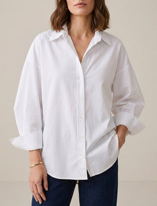 White linen summer top for women with button front, stylish and lightweight from Christine Brewer, perfect for warm weather.