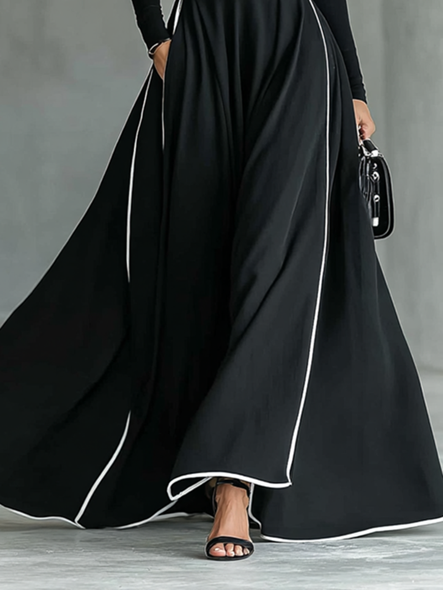 White long sleeve maxi dress for women by Christine Brewer, flowing fabric, fitted bodice, and elegant ankle-length design.