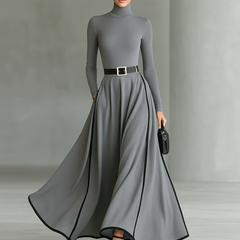 White long sleeve maxi dress for women by Christine Brewer, featuring a flowing fabric and elegant design.