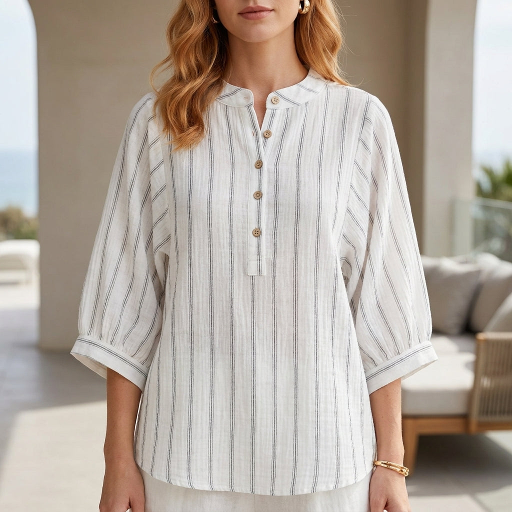 White striped linen summer blouse for women with button front, by Christine Brewer, featuring a relaxed, breathable fit.