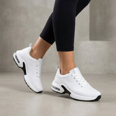 White knit women's sneakers from Christine Brewer, stylish and comfortable women's shoes with a soft, textured fabric design.
