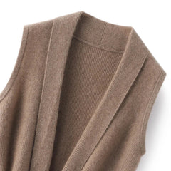 Women’s cashmere wool knit vest with lapel collar, sleeveless design, soft merino wool, featuring a drawstring for a cozy autumn look.