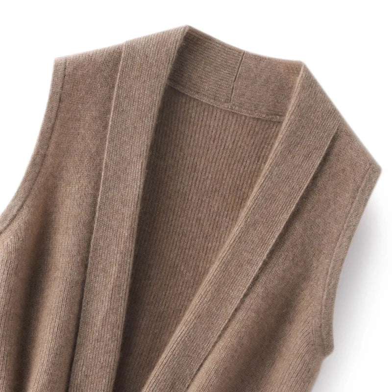 Women’s cashmere wool knit vest with lapel collar, sleeveless design, soft merino wool, featuring a drawstring for a cozy autumn look.