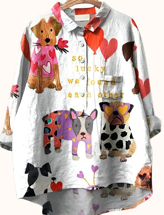 Women wearing a relaxed dog-print graphic button-up shirt by Christine Brewer, showcasing a casual, stylish women’s shirt.