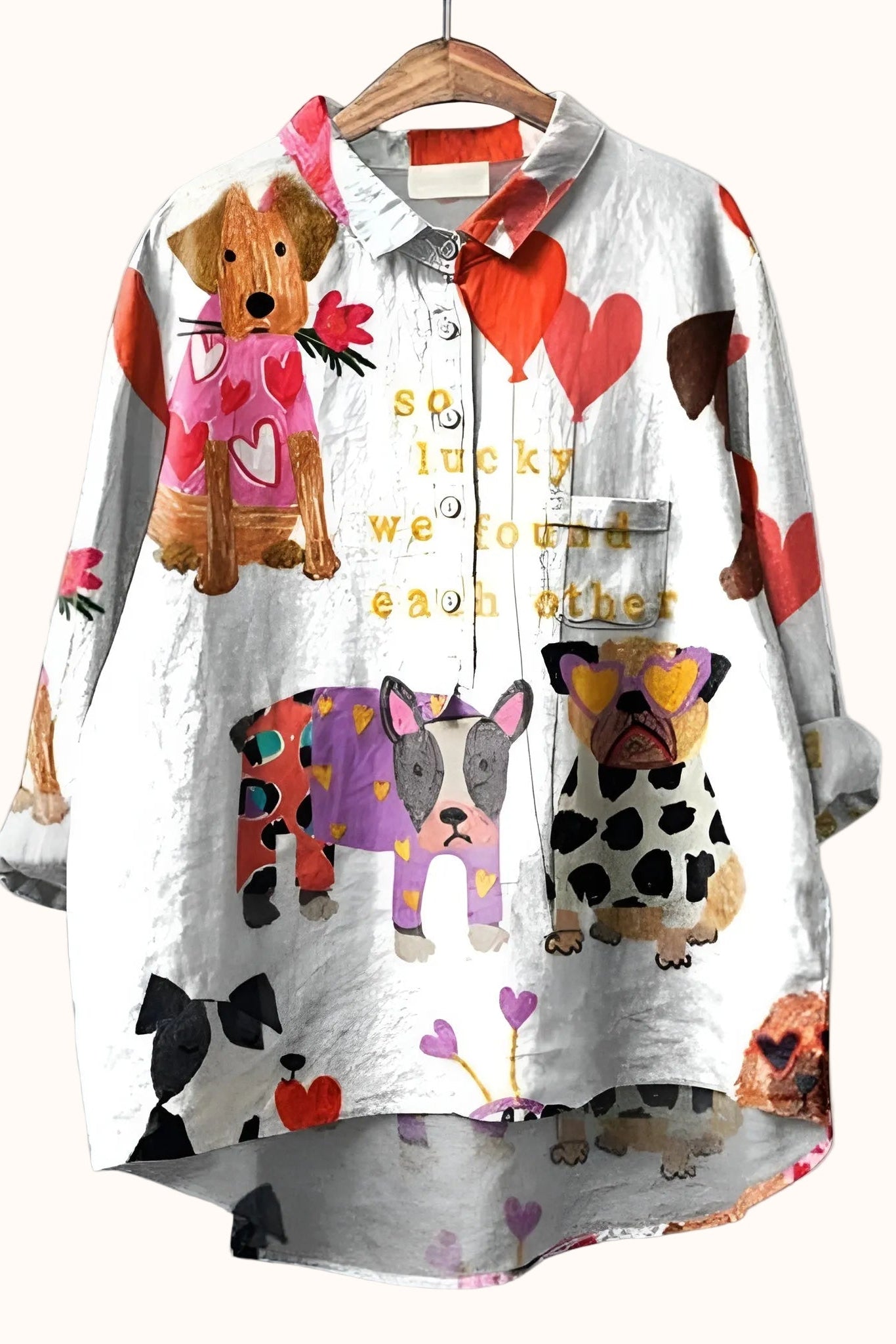 Women wearing a relaxed dog-print graphic button-up shirt by Christine Brewer, showcasing a casual, stylish women’s shirt.