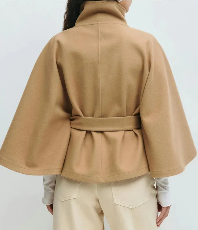 Women’s spring belted high-neck cape coat with funnel neck and long sleeves, in a stylish design by Christine Brewer.
