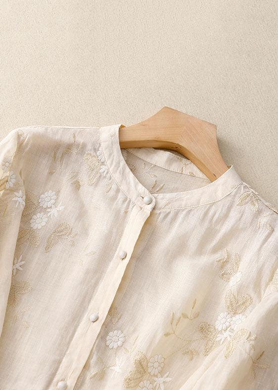 Floral green blouse for women by Christine Brewer featuring intricate embroidery, casual fit, and lightweight fabric.