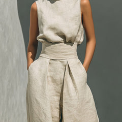 Soft, breathable cotton-linen bedding set by Christine Brewer, featuring plush pillows and a cozy, textured duvet cover.