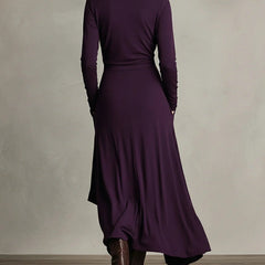 Women’s summer maxi dress by Christine Brewer featuring a high neck and long sleeves, in a flowing, lightweight fabric.