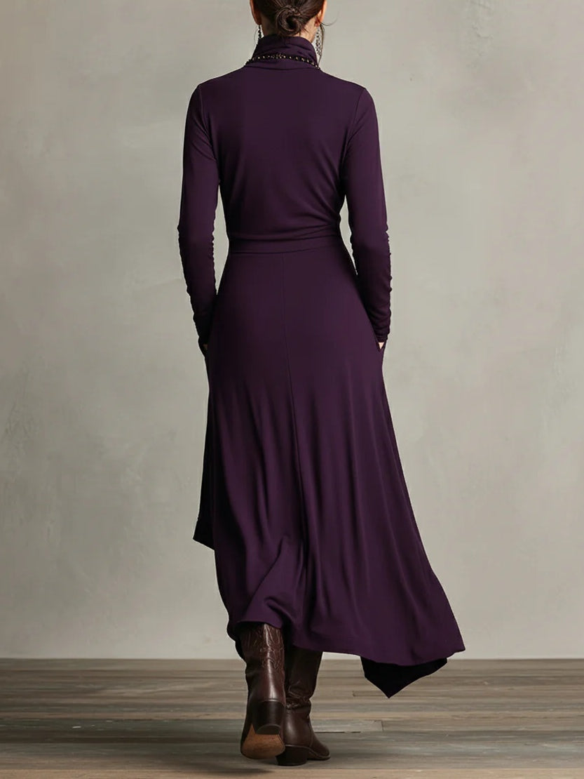 Women’s summer maxi dress by Christine Brewer featuring a high neck and long sleeves, in a flowing, lightweight fabric.