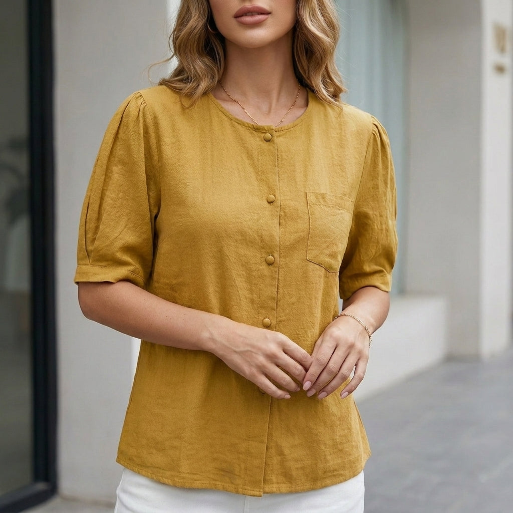 Yellow linen summer blouse for women with short sleeves and front pockets by Christine Brewer, casual and breathable top.