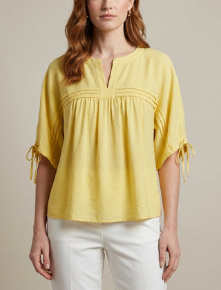 Yellow linen summer blouse for women by Christine Brewer, flowy and lightweight top perfect for warm weather.