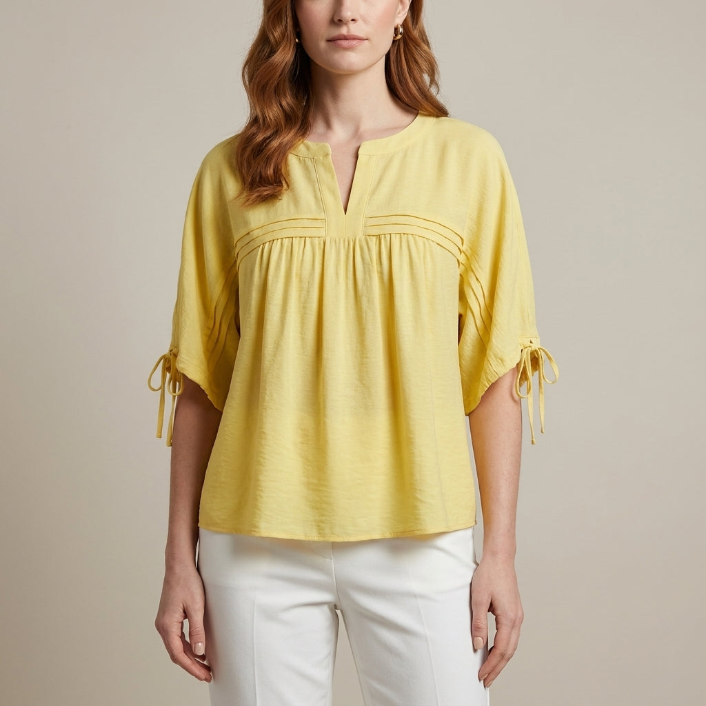 Yellow linen summer blouse for women by Christine Brewer, flowy and lightweight top perfect for warm weather.