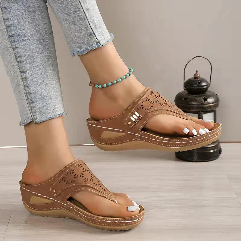 Laser-cut thong wedge sandals for women by Christine Brewer, featuring orthopedic support, soft leather, and slip-resistant soles.