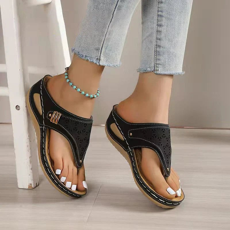 Laser-cut thong wedge sandals for women by Christine Brewer featuring orthopedic support, soft leather, and anti-slip soles.