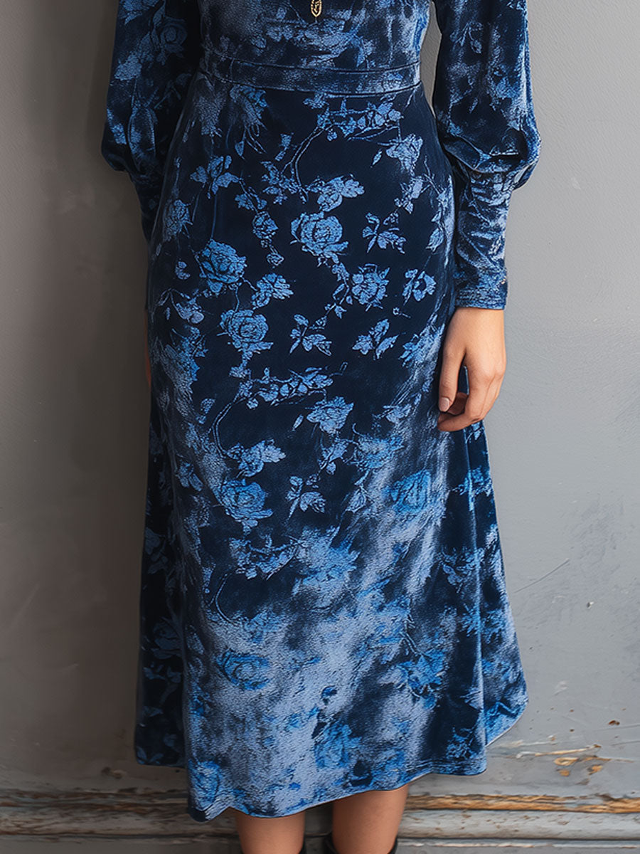 Retro rose-print velvet turtleneck midi dress by Christine Brewer displayed on a hanger showing its floral pattern and elegant silhouette.