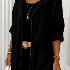 Women’s Iris hooded jacket by Christine Brewer, featuring a stylish design with a zip front and adjustable hood.